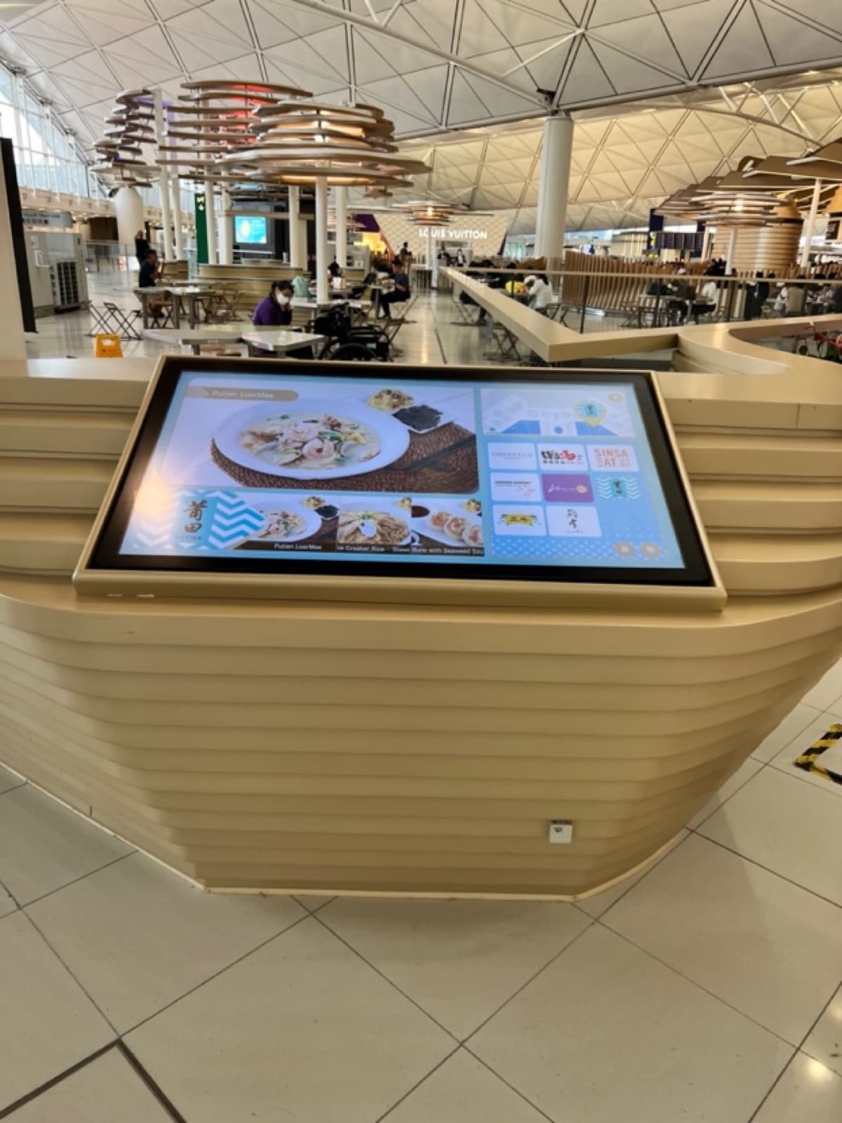Free-standing interactive food court kiosk at HKIA Terminal 1