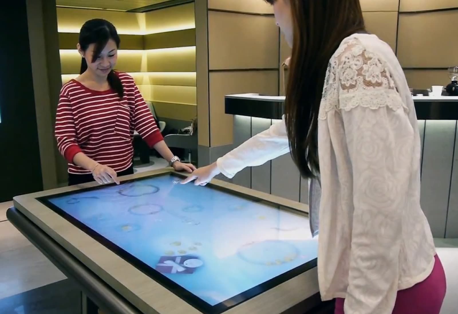 Interactive touch table at the HSBC Museum & Archive